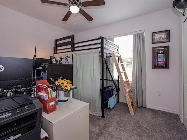 bedroom featuring a ceiling fan, carpet flooring, and baseboards