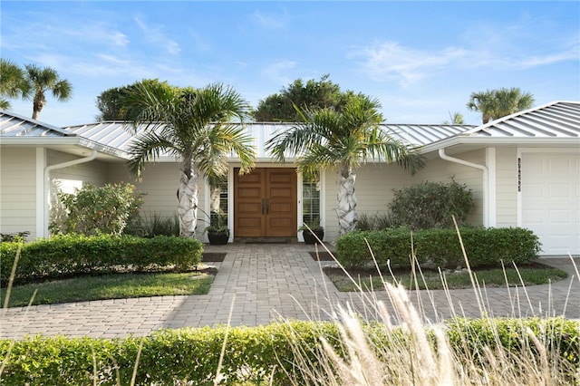 view of front of house with a garage