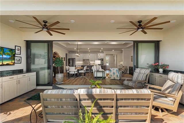 living room with ceiling fan