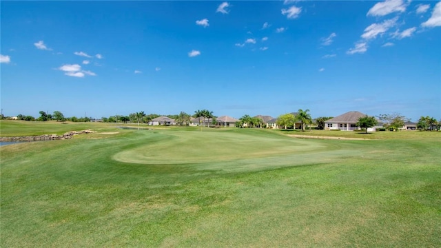1370 Bunker Ct, Vero Beach, FL 32966 - surrounding community with golf course view, a residential view, and a lawn