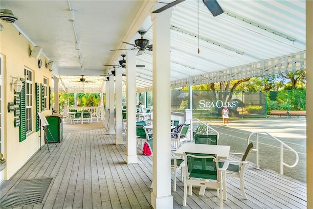 exterior space featuring a ceiling fan and track lighting