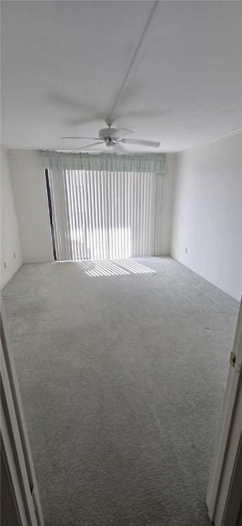 1850 Bay Rd Unit 3F, Vero Beach, FL 32963 - spare room featuring ceiling fan and carpet