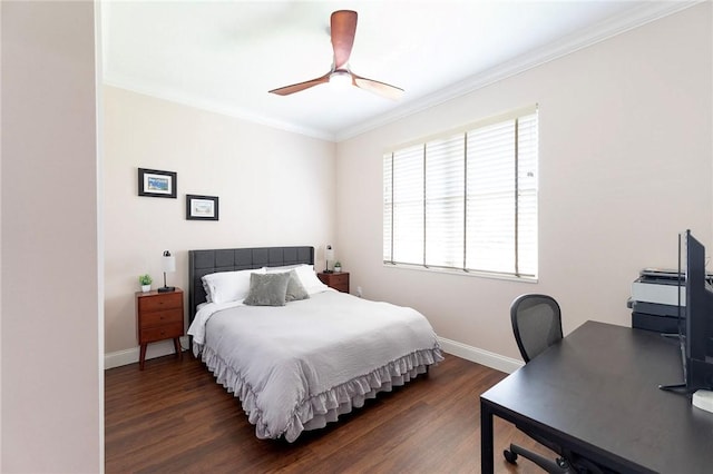 bedroom featuring ornamental molding, wood finished floors, baseboards, an office area, and a ceiling fan