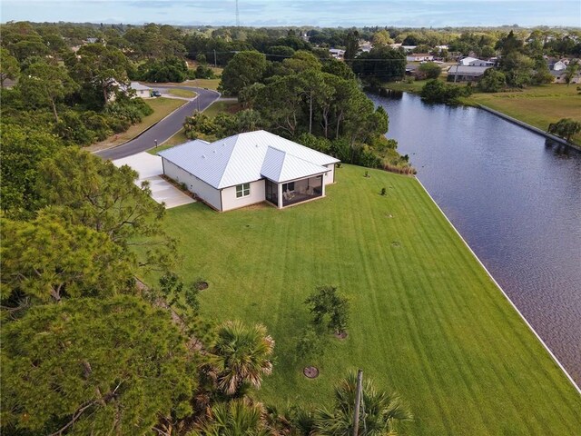 view of subject property with a nearby body of water