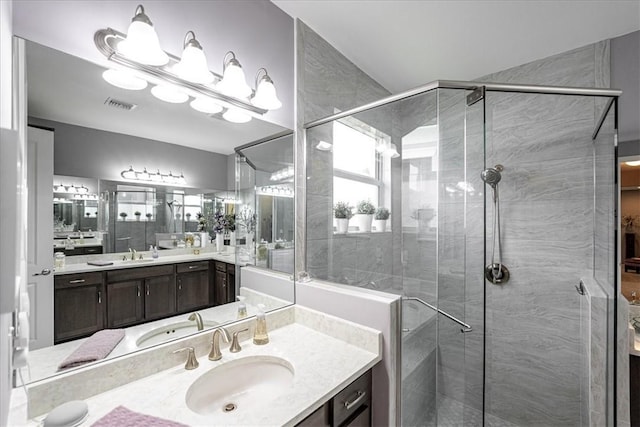11706 SW Brighton Falls Dr, Port St Lucie, FL 34987 - full bath featuring a stall shower and vanity