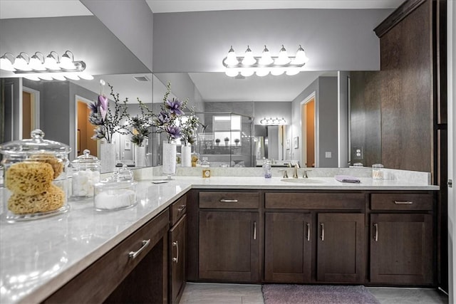 11706 SW Brighton Falls Dr, Port St Lucie, FL 34987 - full bath with a stall shower, vanity, and tile patterned floors