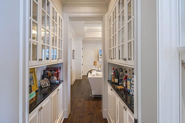 bar featuring coffered ceiling, white cabinets, dark hardwood / wood-style floors, and beam ceiling