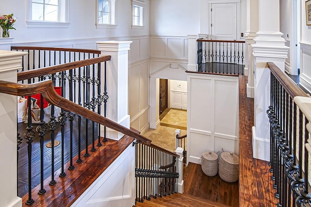 stairs featuring wood-type flooring