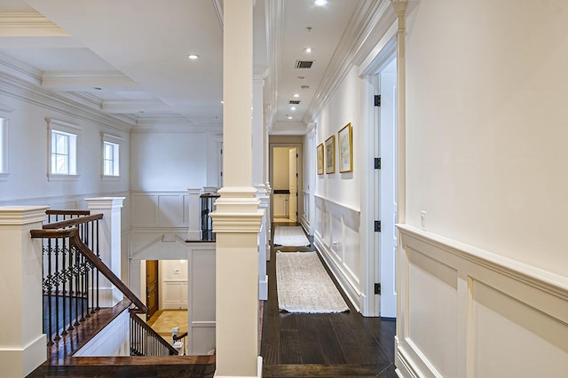 hall featuring coffered ceiling, wood-type flooring, ornamental molding, and beamed ceiling