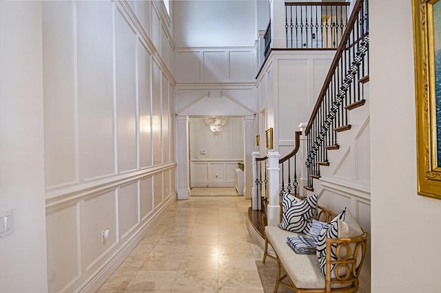 entryway featuring a high ceiling