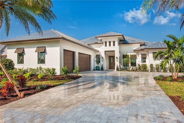 view of front of property with a garage