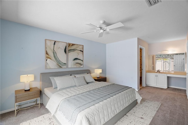 640 N Centre Ct SW Unit 102, Vero Beach, FL 32962 - carpeted bedroom with ceiling fan and baseboards