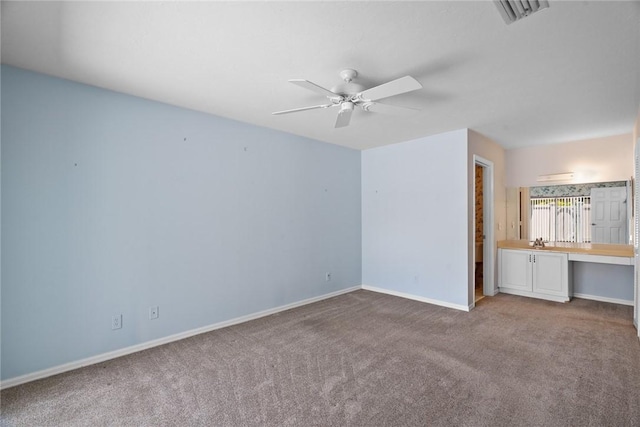 640 N Centre Ct SW Unit 102, Vero Beach, FL 32962 - unfurnished bedroom with carpet and a ceiling fan