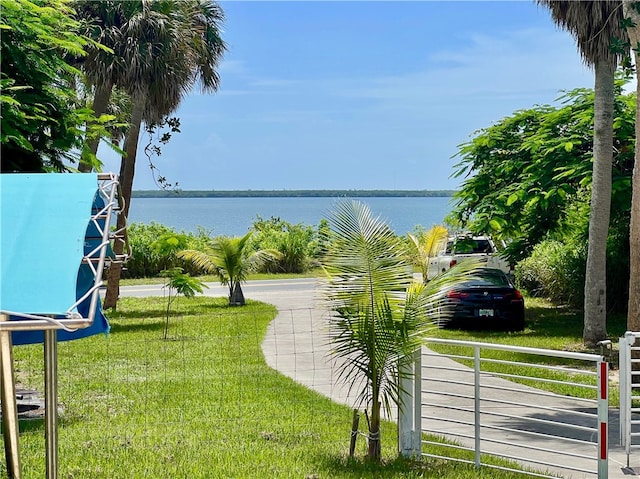 view of yard with a water view