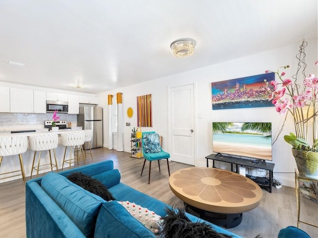 living room with light wood-type flooring