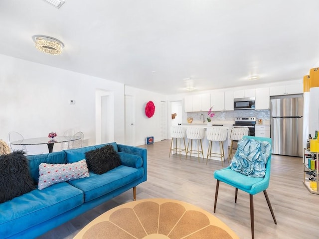 living room featuring light hardwood / wood-style flooring