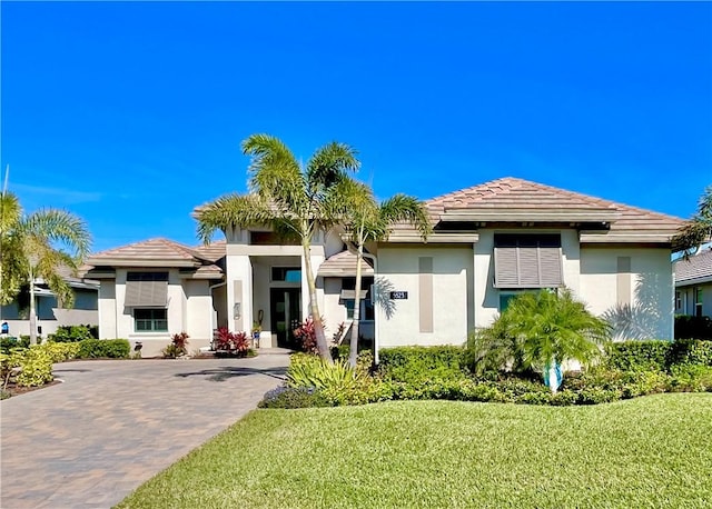 view of front of home with a front lawn