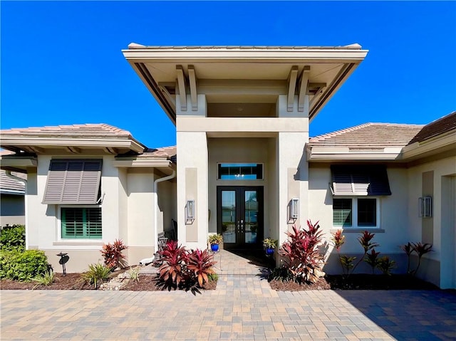 doorway to property featuring french doors