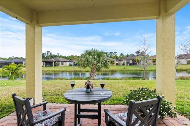 view of patio / terrace featuring a water view