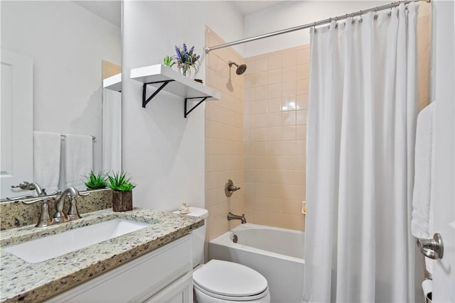 full bath featuring shower / tub combo, vanity, and toilet