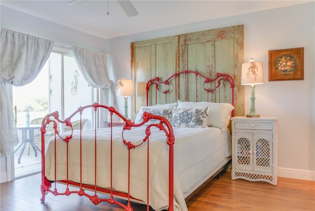 bedroom featuring light wood-type flooring and ceiling fan