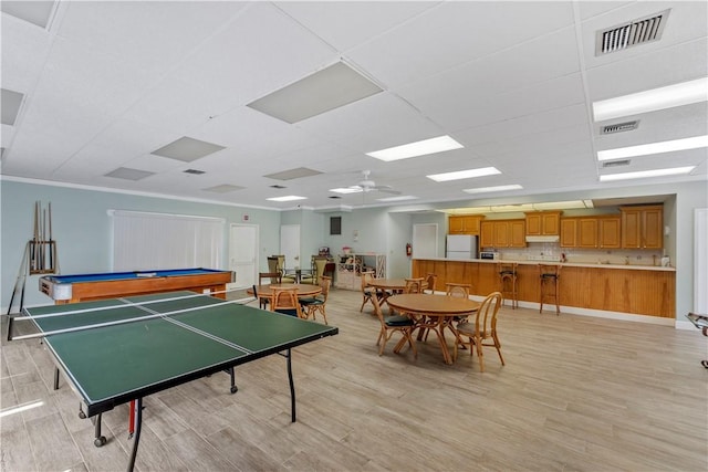 1801 Indian River Blvd Unit C1, Vero Beach, FL 32960 - playroom featuring light wood finished floors, a ceiling fan, pool table, and a paneled ceiling