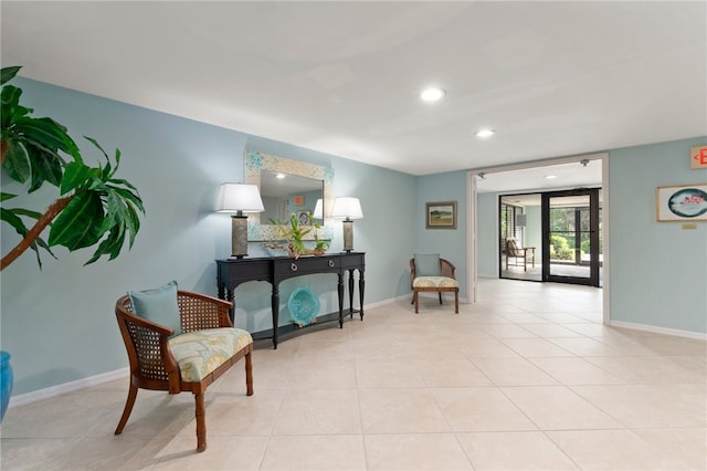 sitting room with light tile patterned flooring