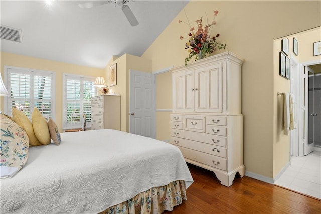 1541 Sabal Ct, Vero Beach, FL 32963 - bedroom with wood finished floors, baseboards, a ceiling fan, and high vaulted ceiling