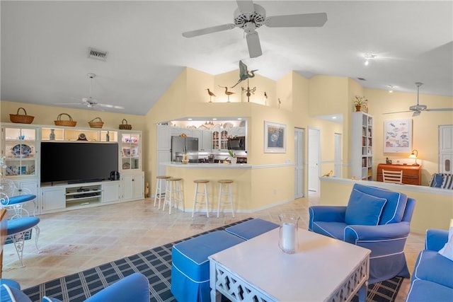 1541 Sabal Ct, Vero Beach, FL 32963 - living area featuring a ceiling fan and vaulted ceiling