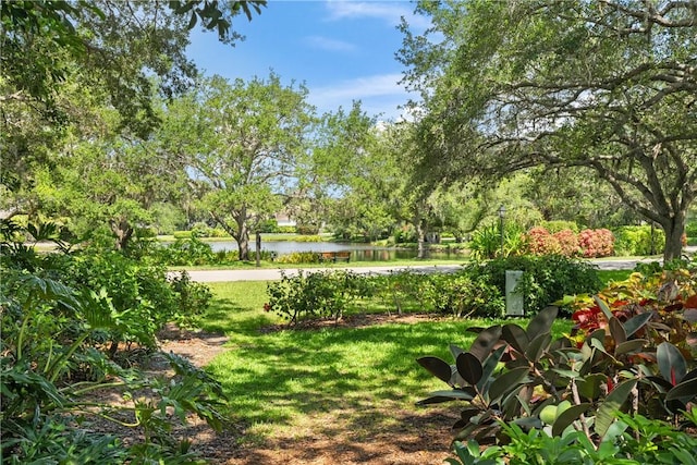 1541 Sabal Ct, Vero Beach, FL 32963 - view of community with a water view and a yard