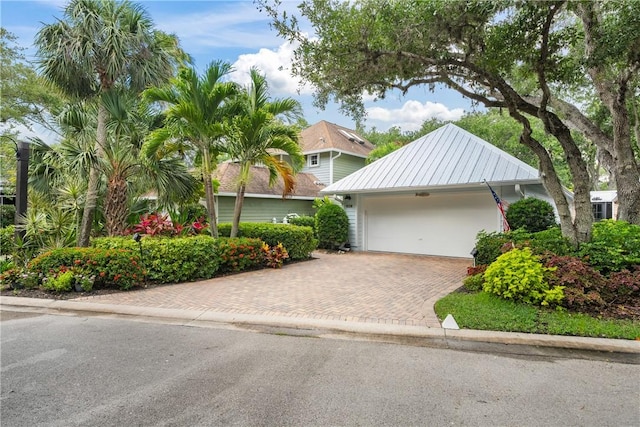 1541 Sabal Ct, Vero Beach, FL 32963 - view of front of home featuring decorative driveway and an attached garage