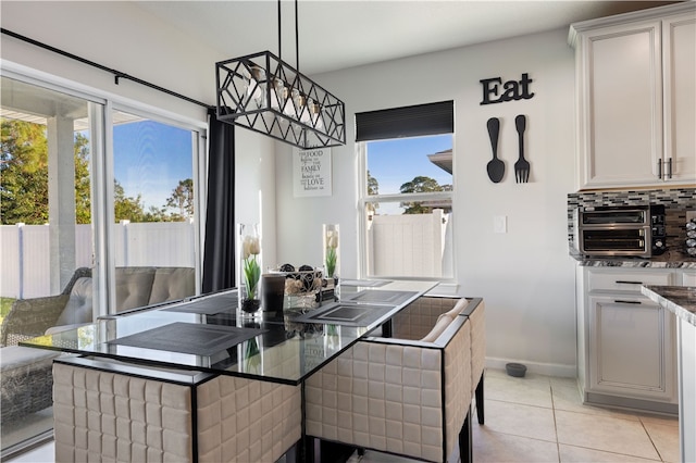 view of tiled dining space