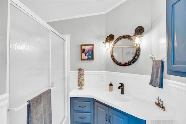 860 Pirates Cove Ln, Fort Pierce, FL 34949 - bathroom featuring crown molding, vanity, and wainscoting