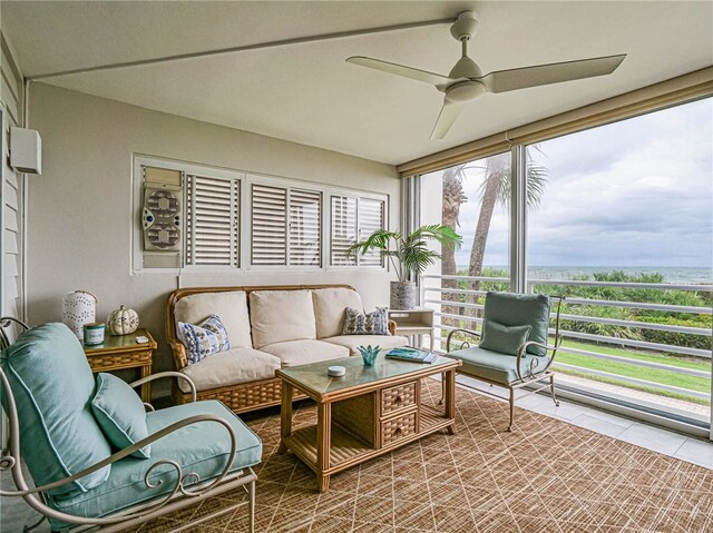 sunroom / solarium featuring ceiling fan and a healthy amount of sunlight