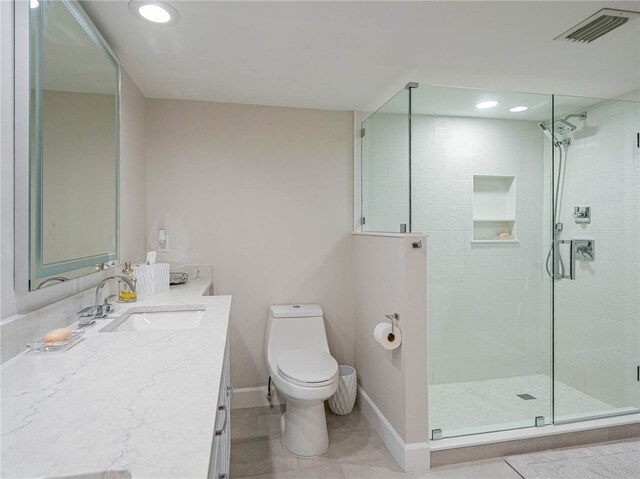 bathroom with walk in shower, tile patterned flooring, vanity, and toilet