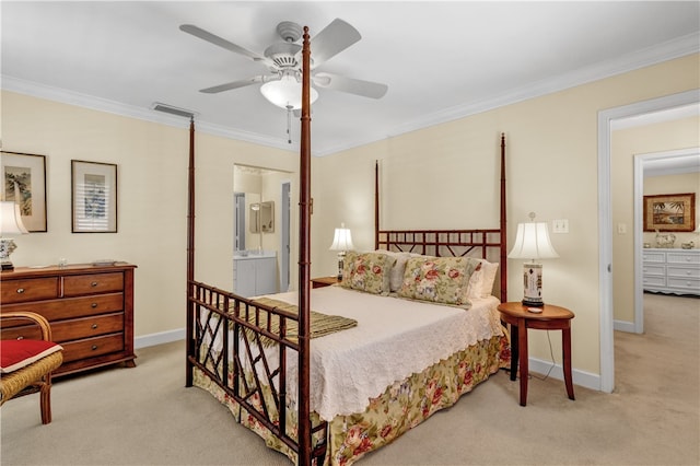 bedroom with crown molding, light carpet, ceiling fan, and ensuite bath