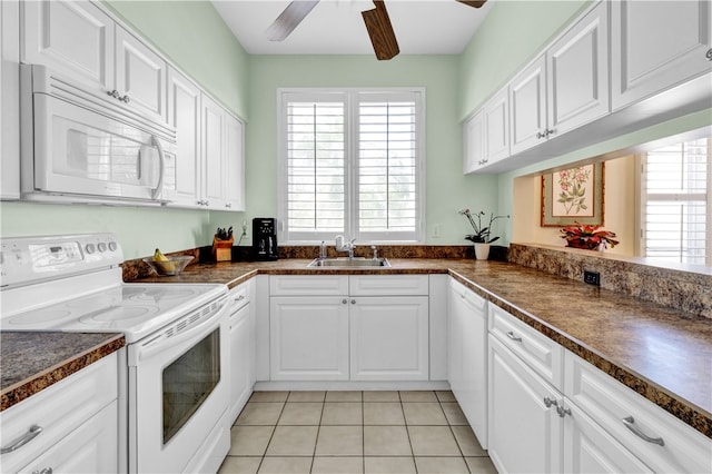 kitchen with white cabinetry, sink, ceiling fan, light tile patterned floors, and white appliances