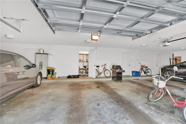 103 W Park Shores Cir Unit 10W, Vero Beach, FL 32963 - garage featuring a garage door opener