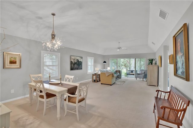 103 W Park Shores Cir Unit 10W, Vero Beach, FL 32963 - dining space featuring carpet floors, ceiling fan, baseboards, and a chandelier