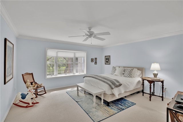 bedroom featuring ceiling fan, crown molding, and carpet flooring