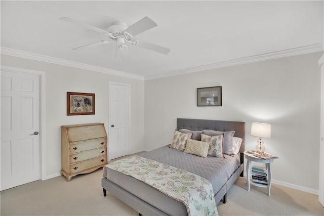 bedroom featuring ceiling fan, light colored carpet, and ornamental molding