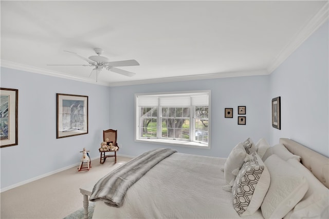 carpeted bedroom featuring ceiling fan and crown molding