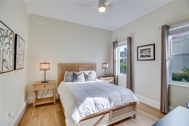 bedroom featuring ceiling fan and light wood-type flooring