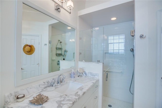 bathroom featuring vanity and walk in shower