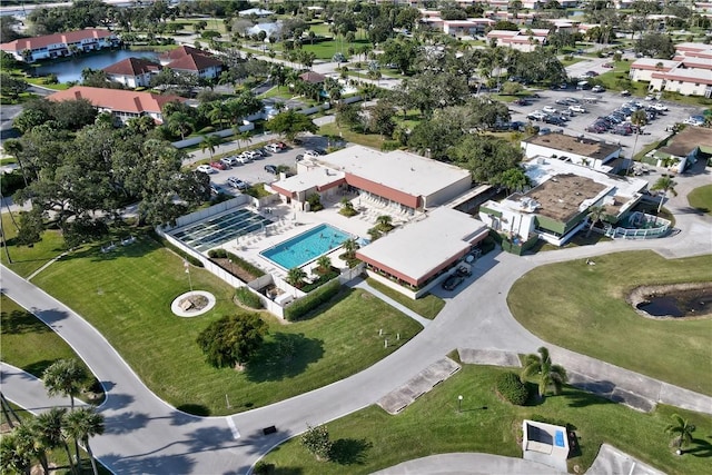 106 Spring Lake Ct Unit 207, Vero Beach, FL 32962 - aerial overview of property's location featuring a pool area and nearby suburban area