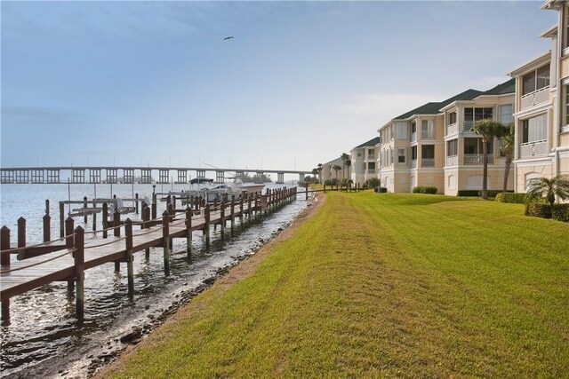 dock area with a water view