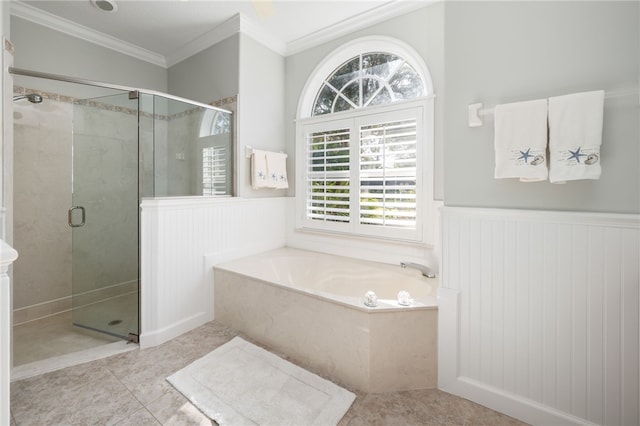 bathroom featuring tile patterned floors, ornamental molding, and separate shower and tub