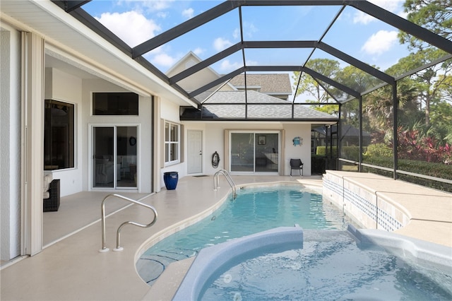 view of pool featuring a patio and a lanai