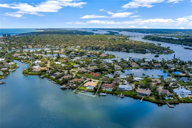 bird's eye view with a residential view and a water view