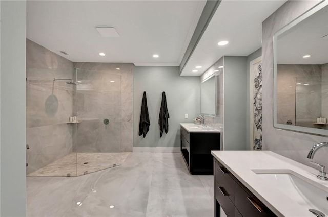 29 Cache Cay Dr, Vero Beach, FL 32963 - bathroom featuring recessed lighting, tiled shower, two vanities, and crown molding